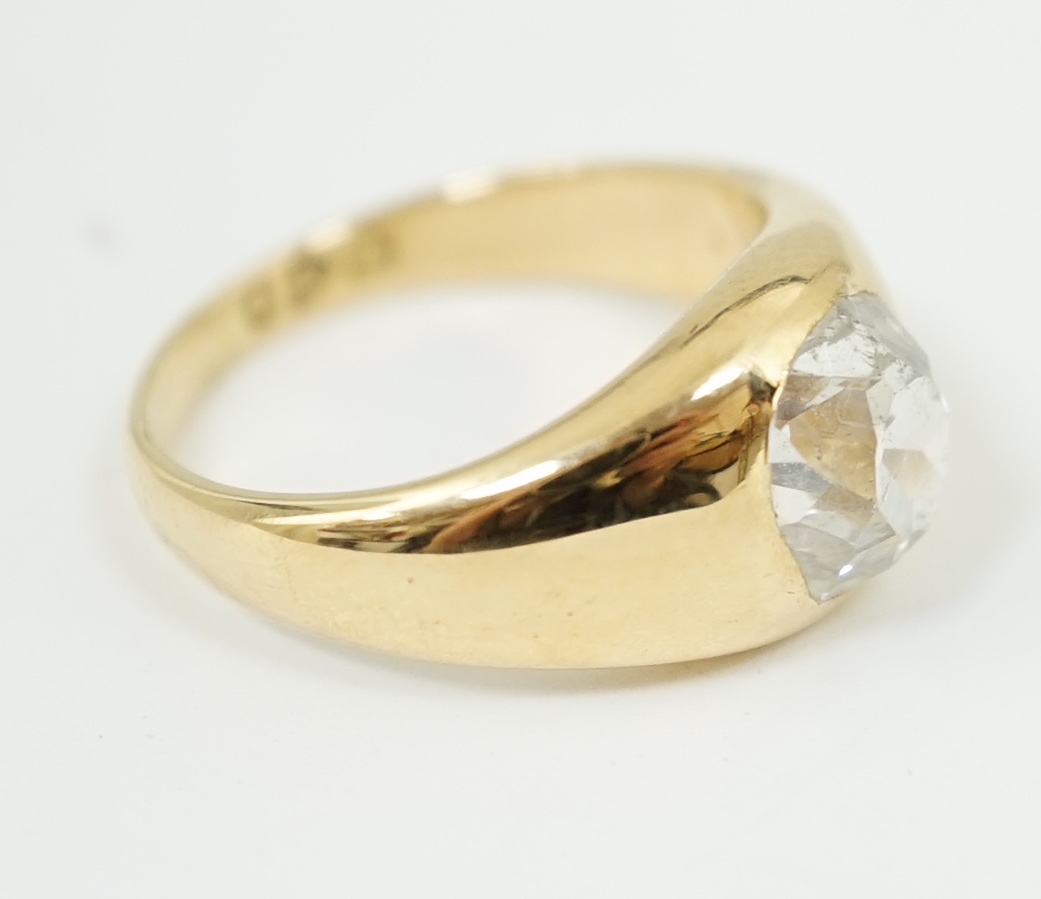 A George V 18ct gold and solitaire diamond gypsy set ring